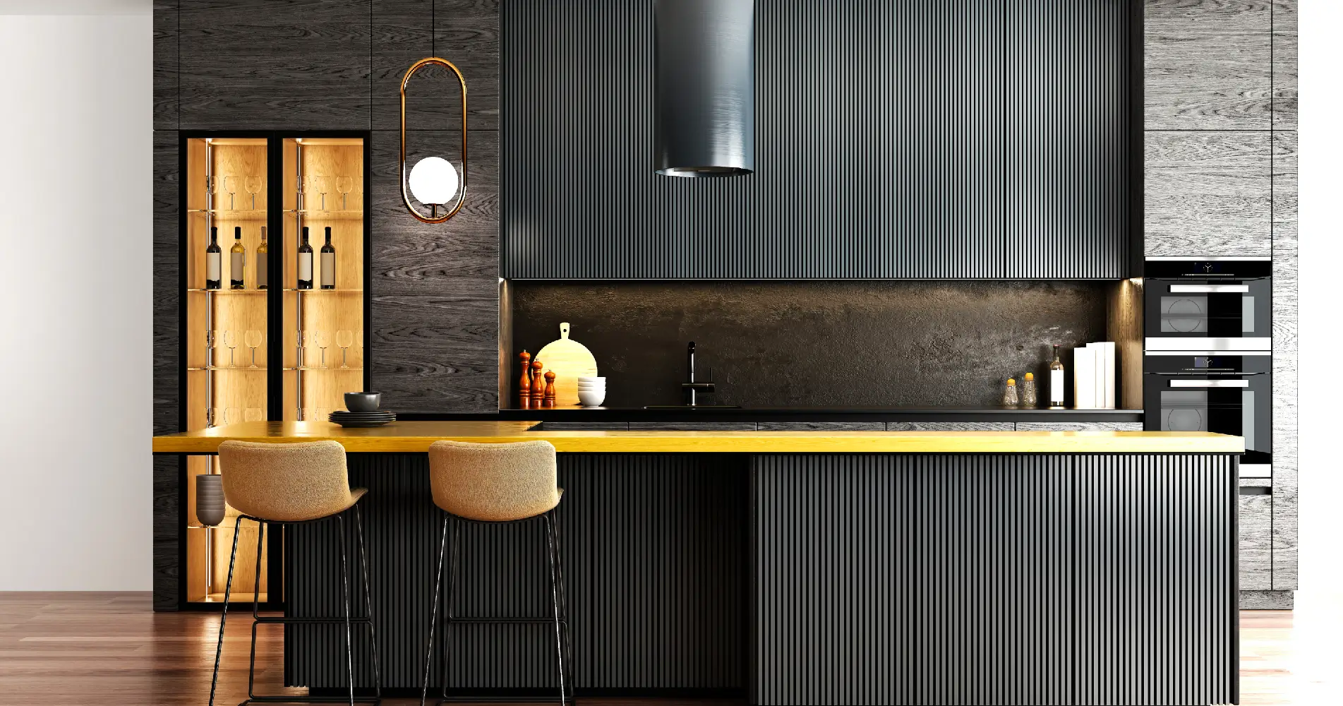 Modern kitchen with gold accents and bar stools.